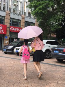 A parasol is a must-have for many Chinese women