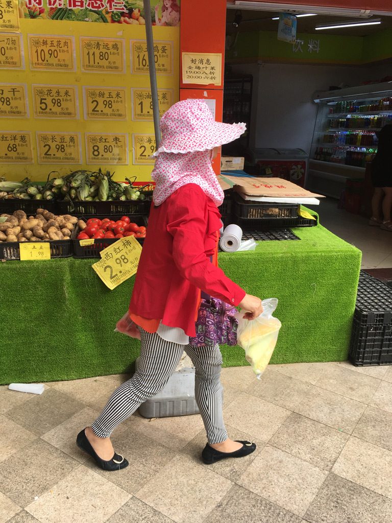 Women take sun protection very seriously in China