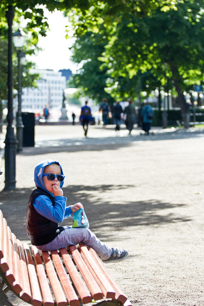 Toddler stopping for a snack in Helsinki, Finland