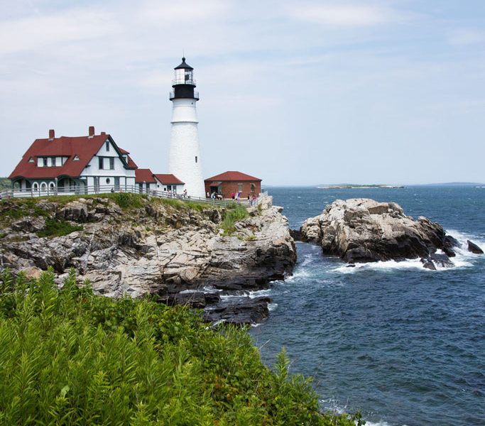A view of Maine's famous Portland Head Light on a sunny summer day